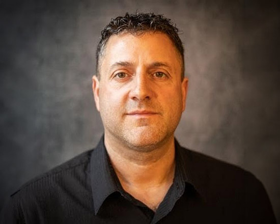 Ron DeCesare, a realtor in Wind Gap, PA with short dark hair, tanned skin, and a dark polo